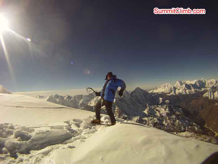 Fernando Joerger enjoying the summit of Amadablam. Photo by Andreas Schelling.