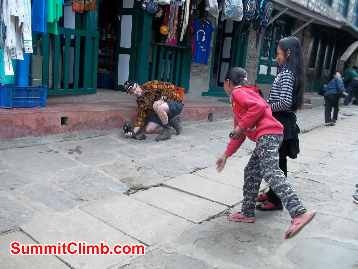 Graham playing with Kids in Lukla
