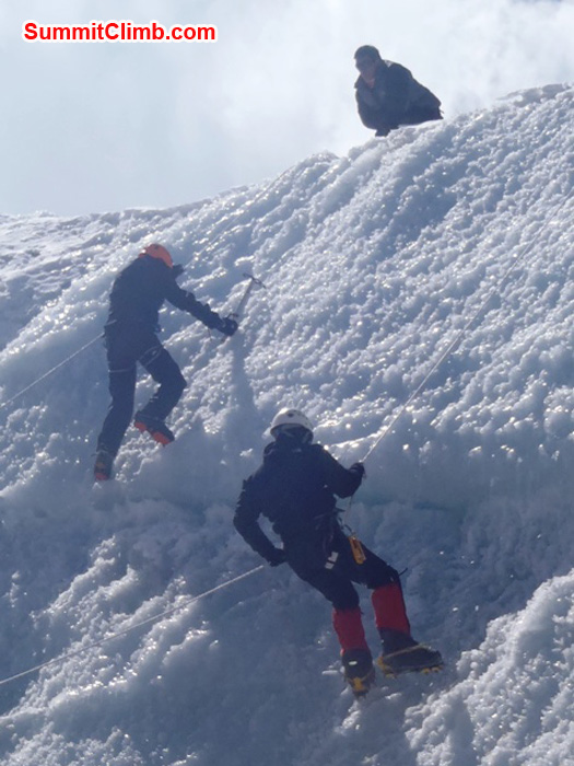Ice practice on Naulekh Glacier - Ang Pasang Sherpa looks on while Frank Seidel ascends and Andrew Davis descends. photo by Richard Cotter from Berghaus