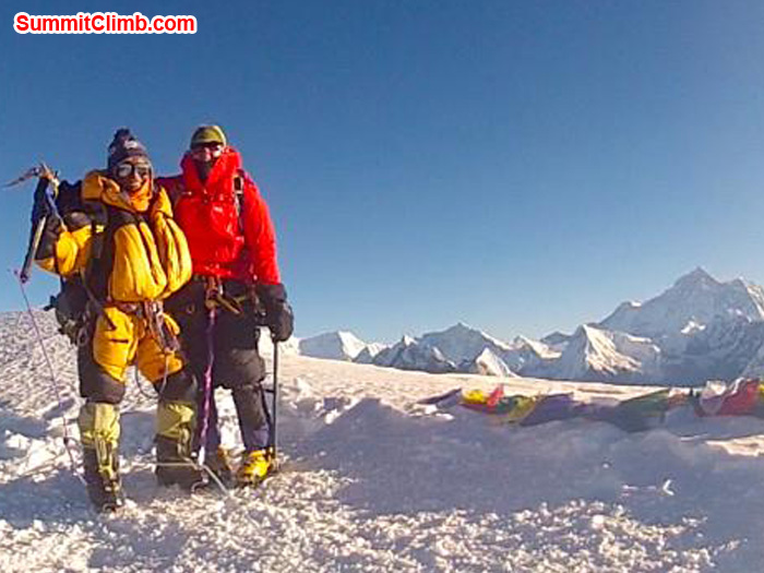 Jangbu Sherpa and Holly Budge on the summit of Mera Peak, Everest in the background. Photo by Corne Deelen