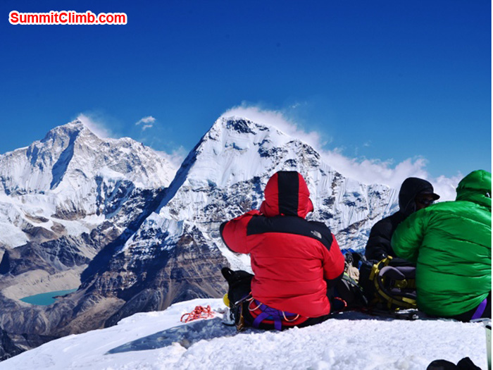 Lounging atop Mera Peak, soaking up the views of Lhotse South Face and Everest. Photo by Michael Moritz.