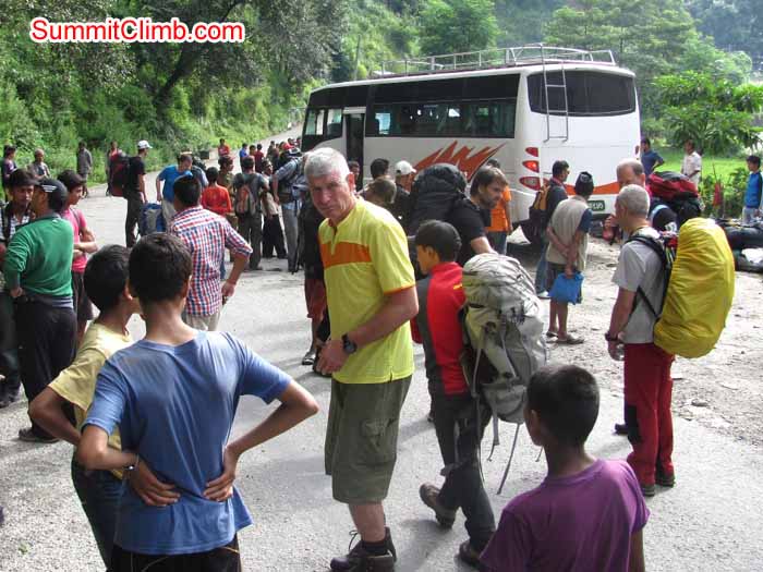 Andre supervising the loading of the bus on the Arniko Highway. Troy Bacon photo