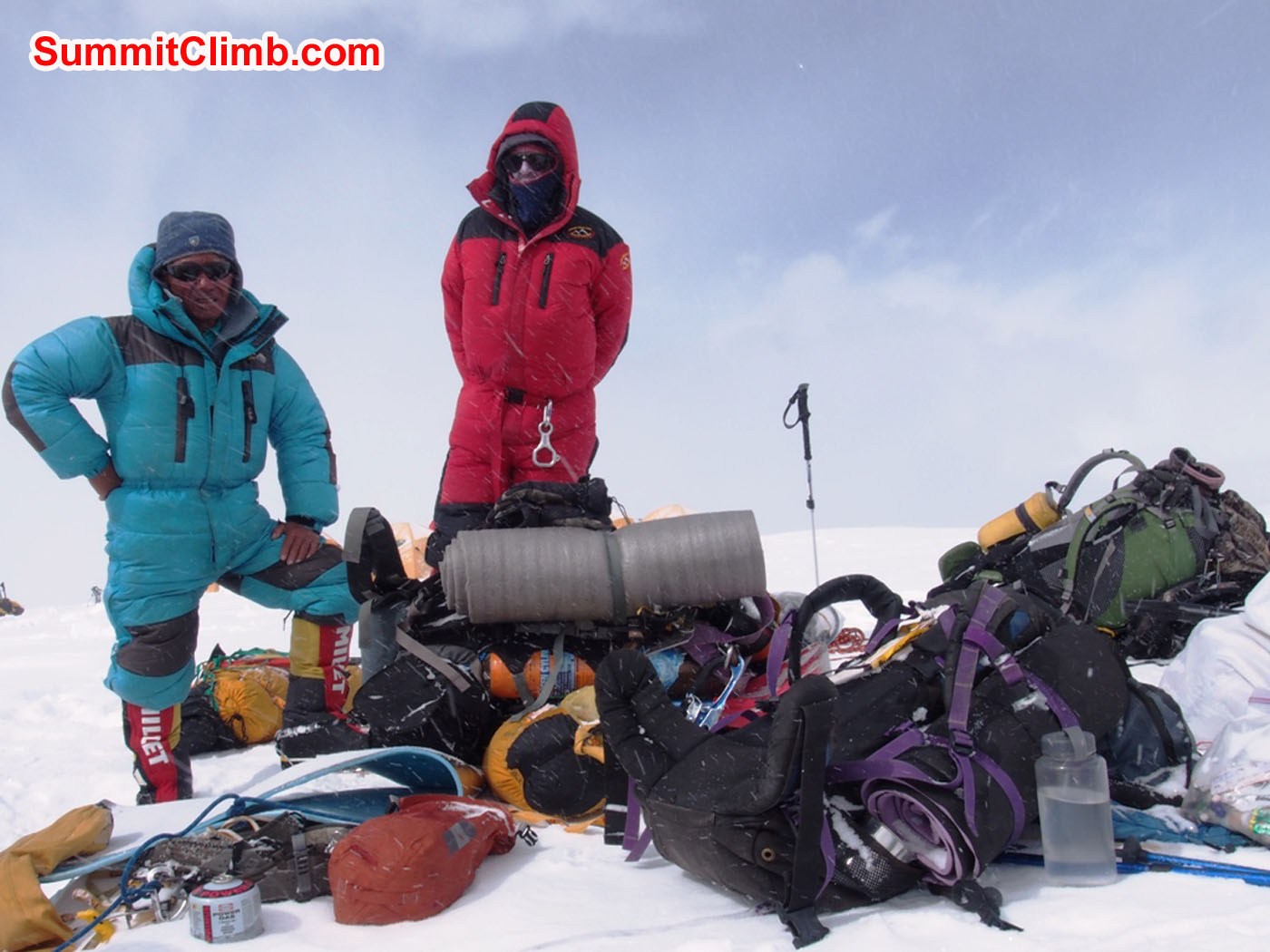 Jangbu and Dan. Packing loads to carry back down the mountain after summiting. Alan Barclay Photo