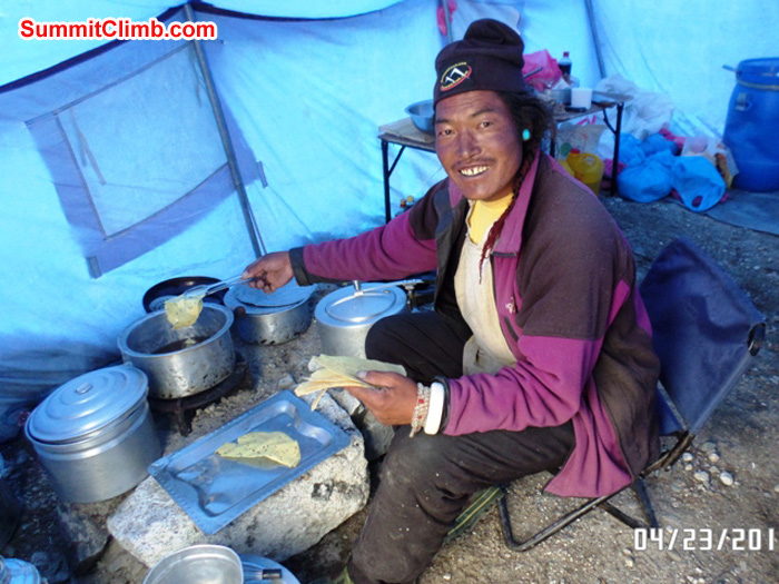 Chimi prepares a delicious lunch after a hard day on the ice. Photo by Ang Pasang Sherpa