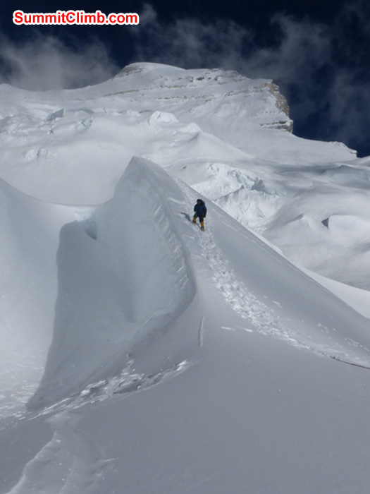 Ang Pasang crests the last frozen snow wave before camp 1.5. Juergen Landmann Photo