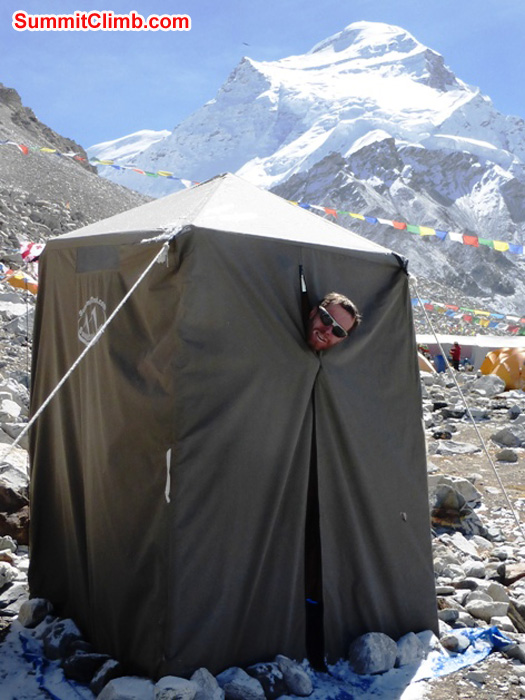 Hot Shower tent in advanced basecamp, Cho Oyu summit in background. Matti Sunell Photo of Juergen