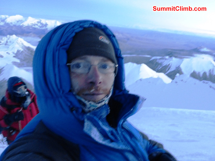 Dan and Juergen Landmann with Tibetan Plateau in the background on summit morning. Juergen Landmann Photo