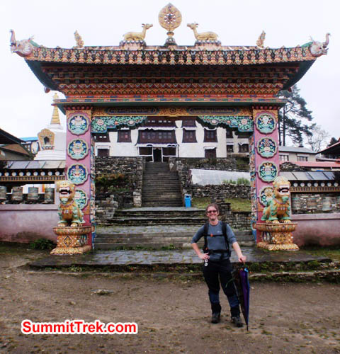 James Barrit standing in front of the gate at the famous Tengboche Monastery. Photo by Maggie Noodle