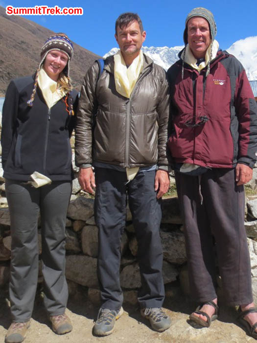 Hannah Rolfson, Brian Rolfson, and Dan Mazur standing in Pangboche Sonam Lodge in front of Everest. Lakpa Gyeluk Photo.