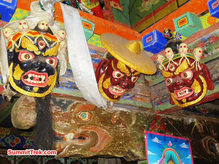 Masks and carved beams inside the Pangboche Gompa. The deity with the large ha on is caled Dorje Lakpa. Photo Hannah Rolfson.