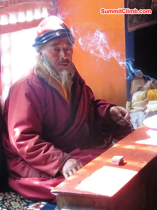 Pangboche lama prepares to conduct his daily prayer. Hannah Rolfson Photo