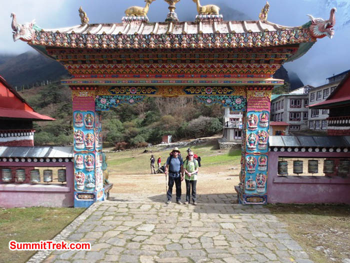 Brian and Hannah Rolson at the gate to Tyengboche Monastery. Lakpa Gyeluk Sherpa Photo