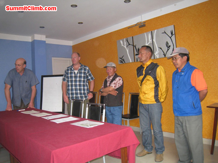 Team briefing at the Shakti hotel - Dan, Arnold, Jangbu, Lakpa, and Kaji. Scott Smith Photo.