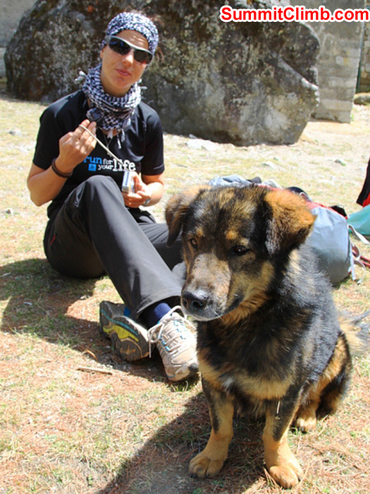 Sandra and a local village dog take a break. Monika Witkowska Photo.