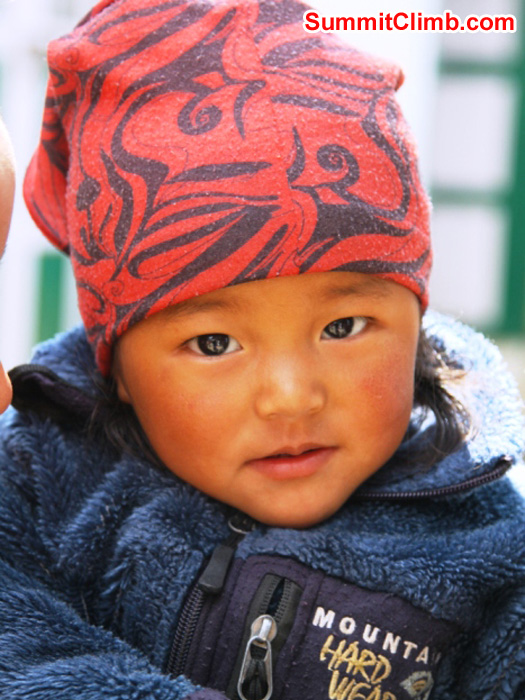 Sherpa child wearing a Mountain Hardwear jacket in Namche. Monika Witkowska Photo.