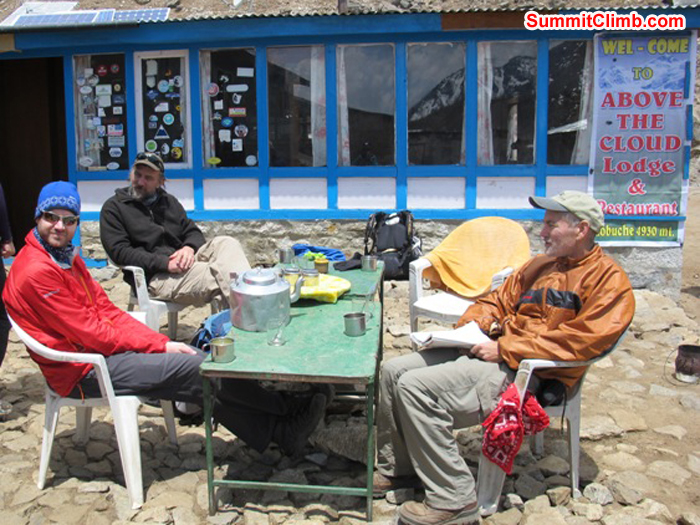 Chris, Adam, and Don enjoy a delicious lunch break at Above the Clouds hotel in Lobuche. Monika Witkowska Photo.