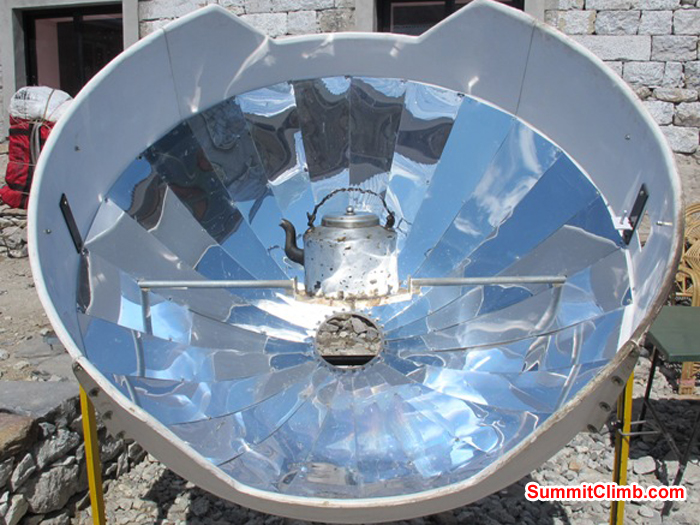 Solar oven heats a kettle of water at the Himalayan Lodge in Gorak Shep. Monika Witkowska Photo.