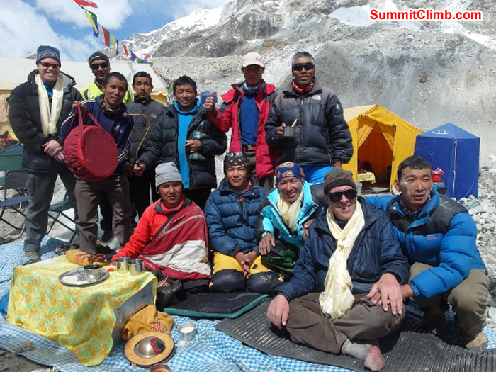 Scott Smith and Sherpa climbing team pose with Pangboche Lama and Dan Mazur during basecamp blessing ceremony. Monika Witkowska Photo.