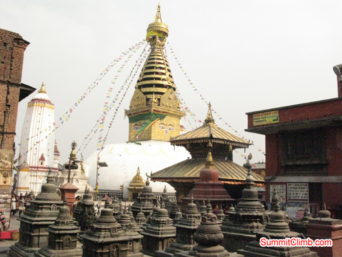 Shyambhu Nath Stupa and one of the Hindu temple in Shoyambhu. Photo Rares Voda
