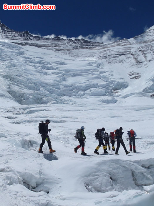 Team walking in the Western Cwm at the base of the Lhotse face. Monika Witkowska photo