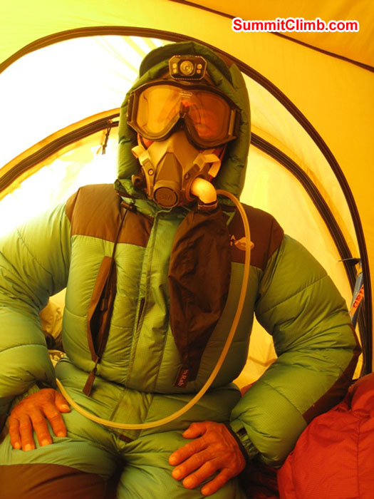 Jangbu prepares for the summit in the tent in South Col. Scott Smith Photo.