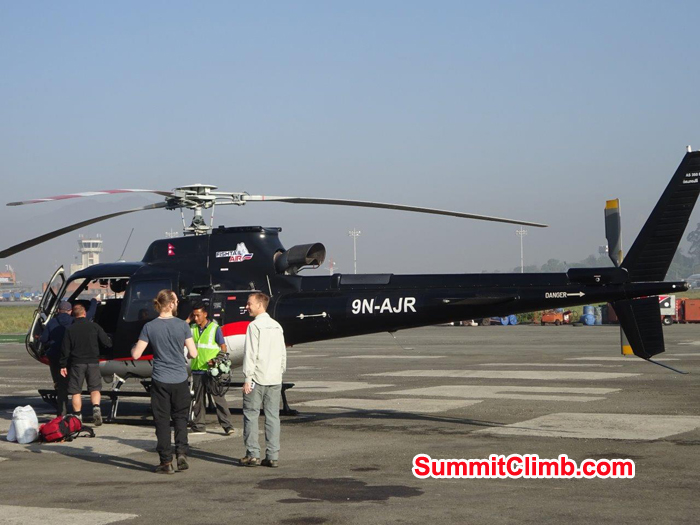 Everest Members ready to take off from heli to Lukla.  Photo Jeff Sorrel