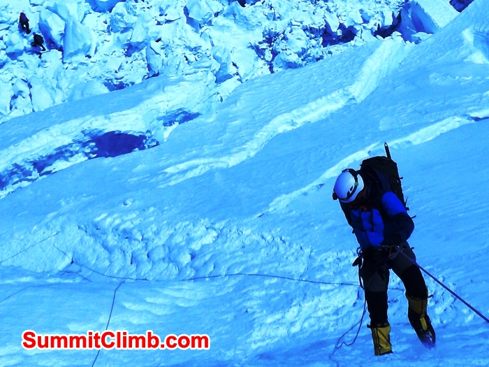 Les Binns from Yorkshire abseiling the face into the Khumbu Icefall, team members below. Mike Fairman Photo