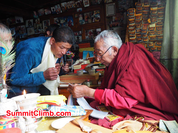 Our sherpa  receiving a blessing from the local Buddhist Lama in Pangboche.