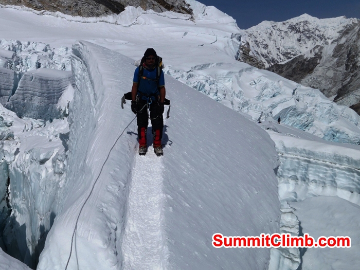 Sange Sherpa descending into the icefall. Franz Ruehrlinger Photo