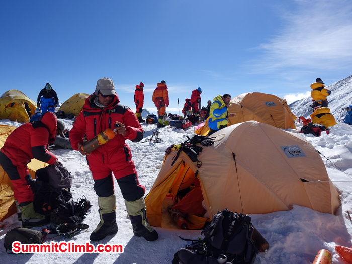 Tenji Sherpa checking oxygen bottles at Northcol. Photo Hubert Klaus