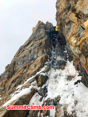Tomaz snakes his way up houses chimney k2