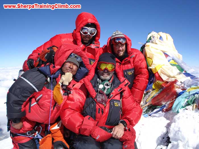 Sange Sherpa and members on the summit of Everest. Photo Sange