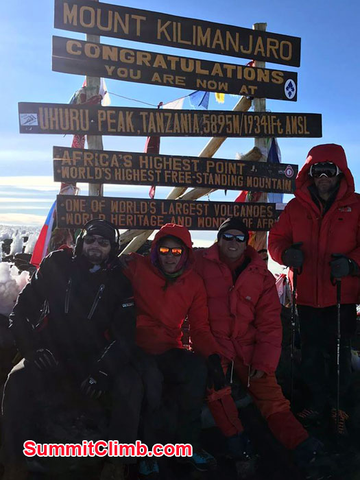 Team at the summit of Kilimanjaro