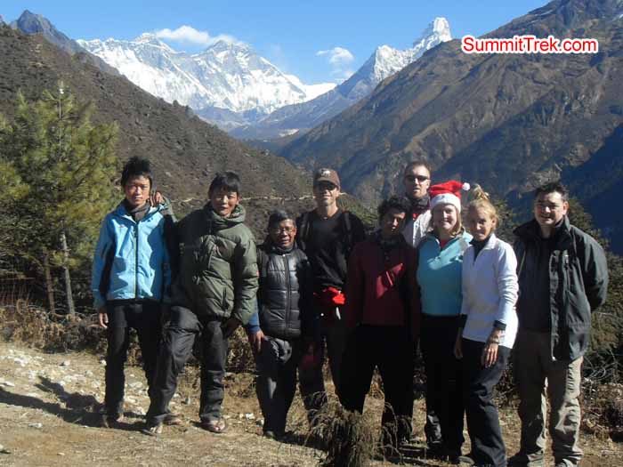 Team posing for photo just 15 minutes way from Namche Bazaar with the view of Everest, Lhotse and AmaDablam. Photo Kaji Tamang.